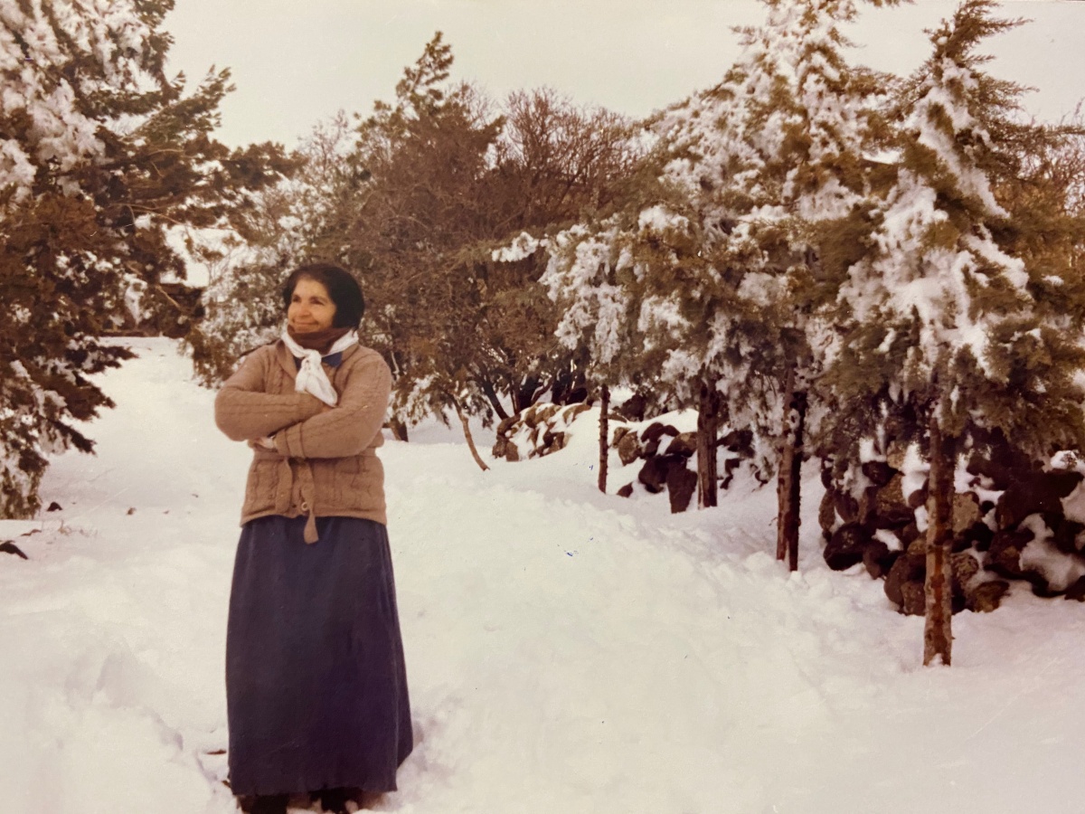 woman standing in the snow