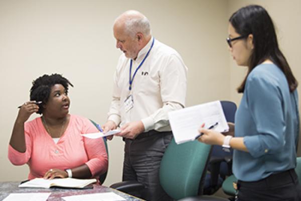 three research faculty and staff talk