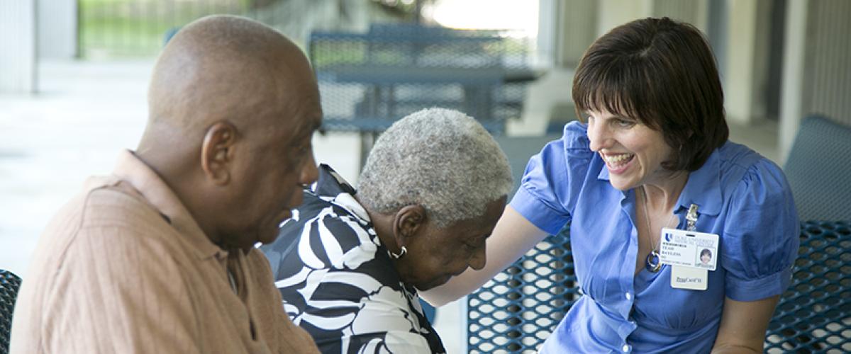 physician with two elderly patients