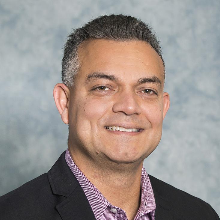 professional headshot of Chester Rodriguez