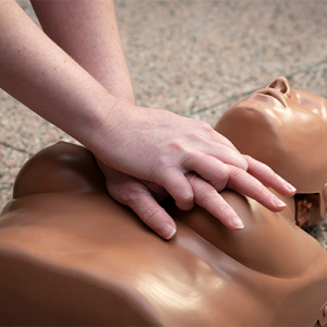 performing CPR on a mannikin